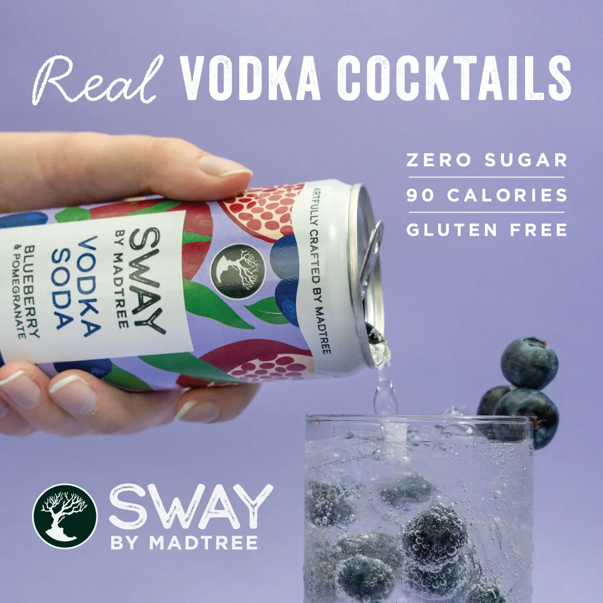Pouring Sway vodka soda over ice with fresh blueberries
